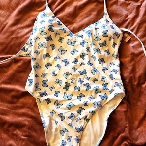 Butterfly one piece swim suit never worn